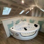 Suite parentale sous combles à Trilport – un espace cocooning repensé par Moreno Création. Suite parentale aménagée sous combles à Trilport avec modification de charpente et création de salle d’eau – Moreno Création